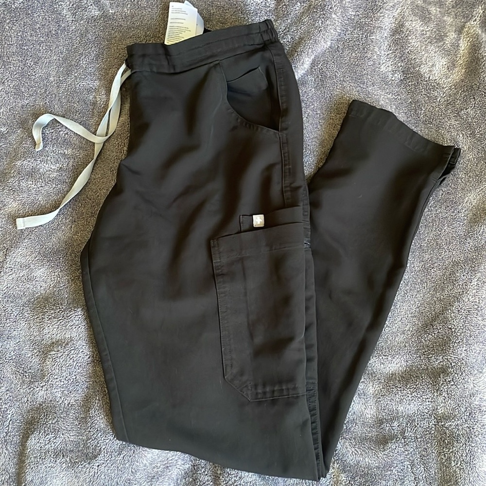 Women’s scrubs! All size X-small. Good condition! Monarch scrubs and one is Figs